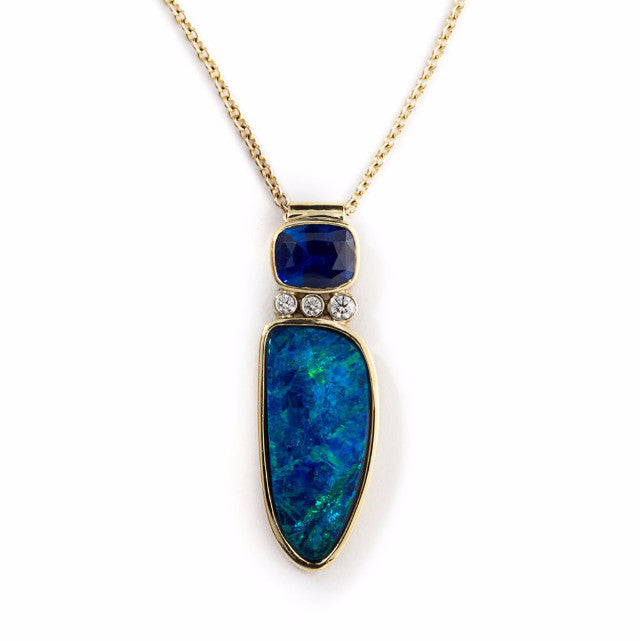Custom Designed Pendant Featuring a Natural Blue Sapphire set against Australian Boulder Opal and accented with Diamonds. 