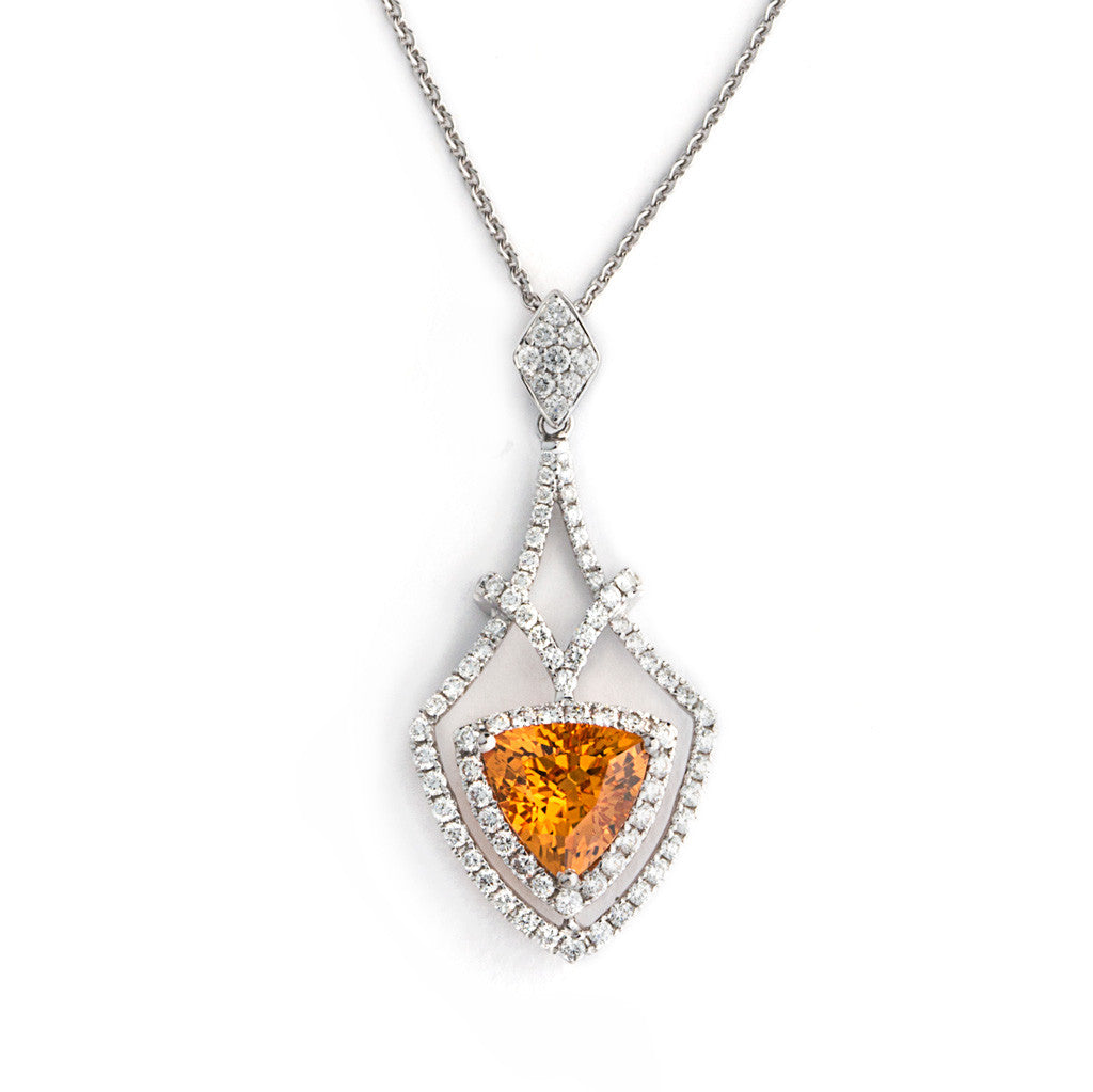 Orange Crush is a Modern Deco style diamond pendant featuring a Mandarine colored Spessartite Garnet.