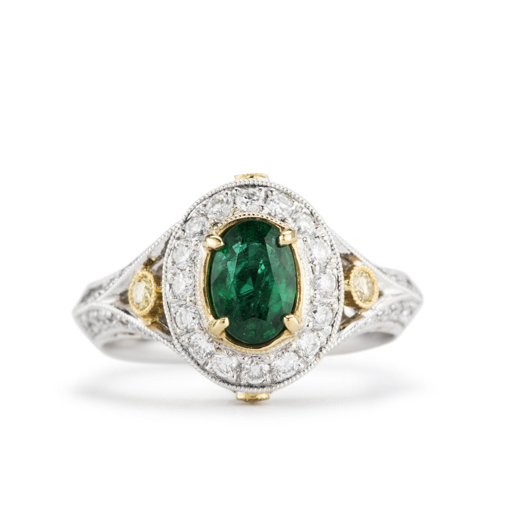 "Aileen" two tone gold and Emerald ring with yellow diamond accents.