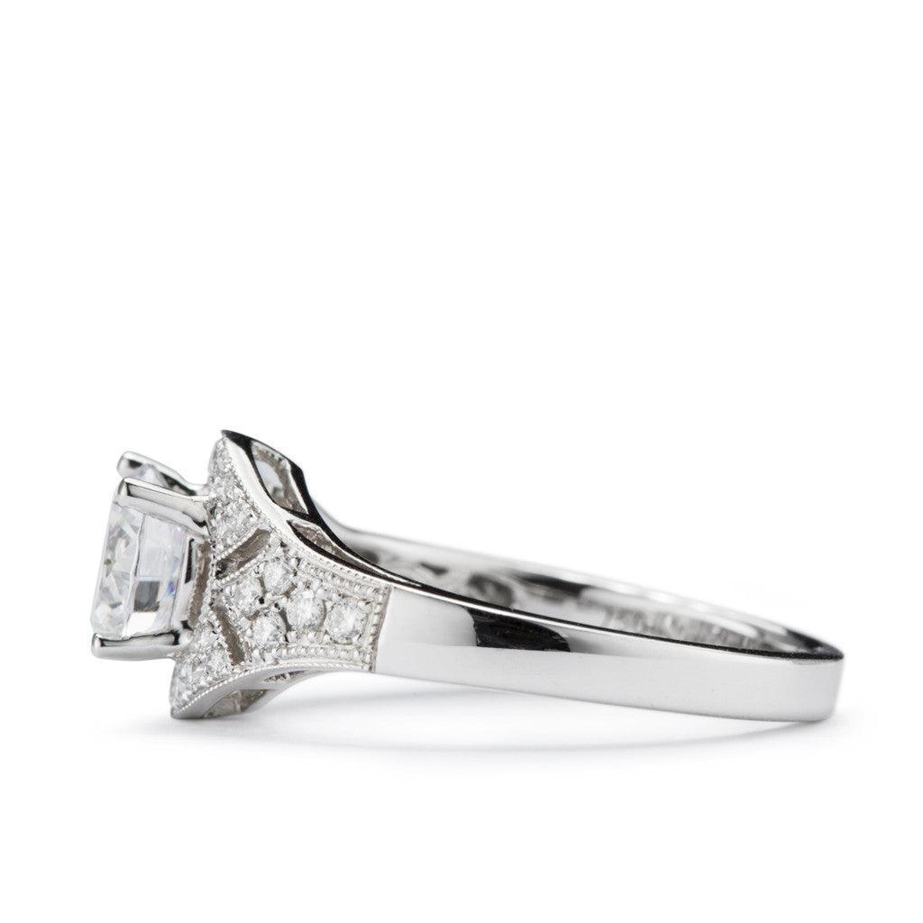 White gold and diamond filigree engagement ring
