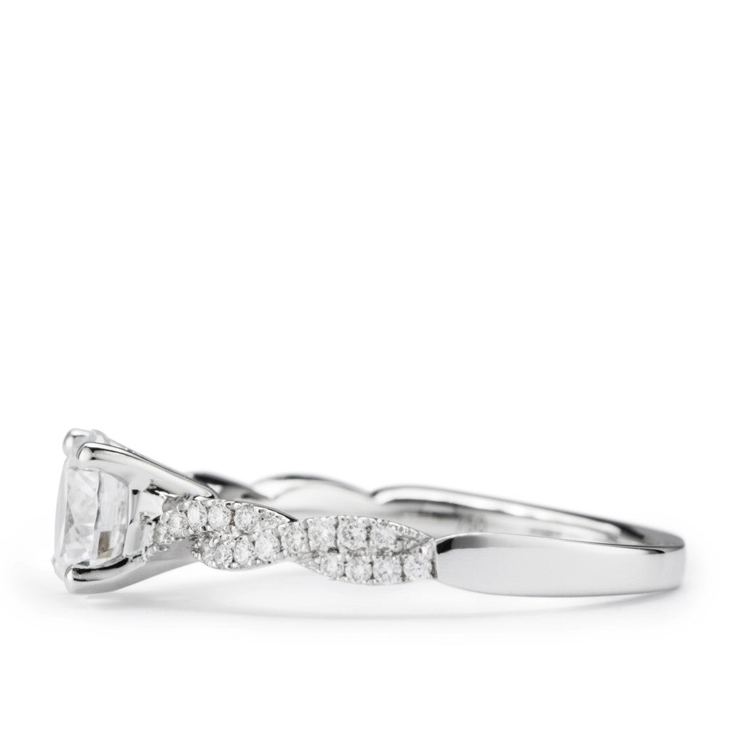 White gold and diamond twisted shank engagement ring. 
