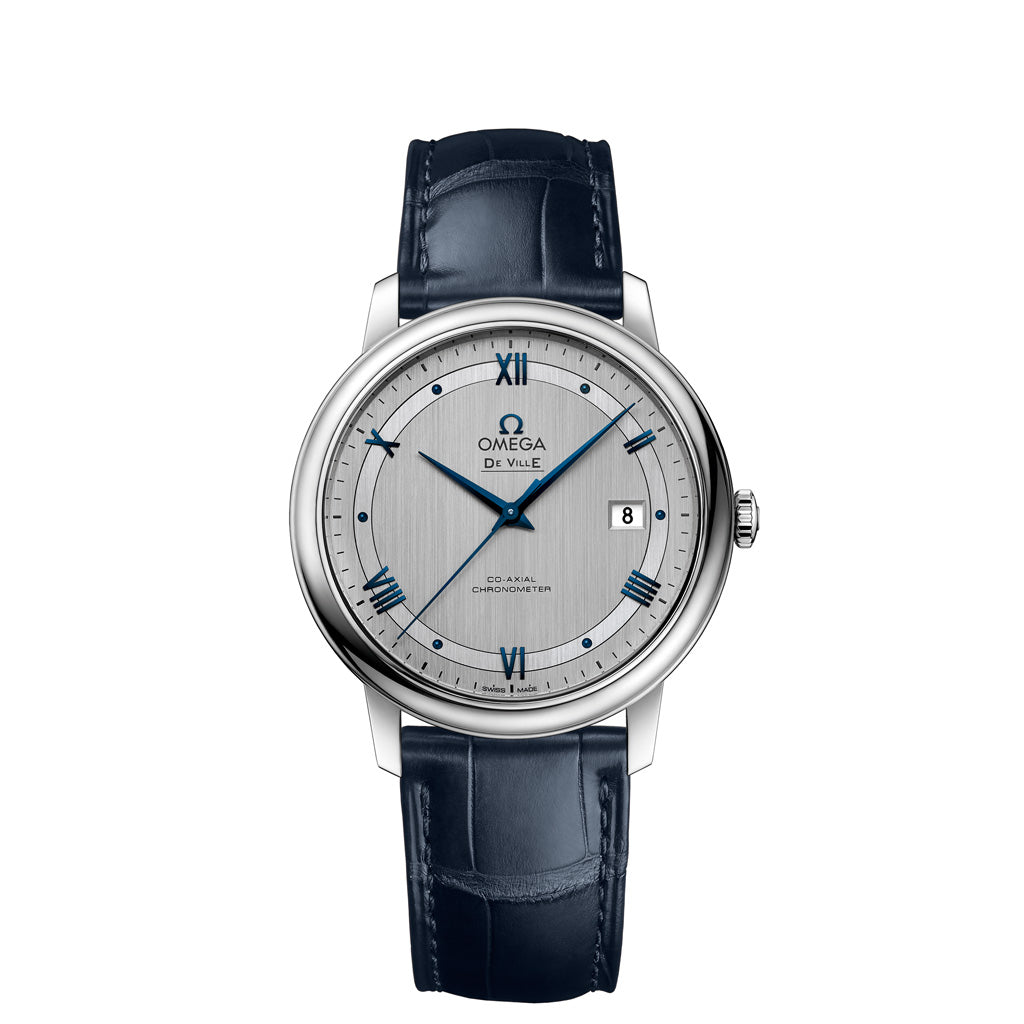 Omega De Ville Prestige Wrist Watch with Stainless Steel Case and brushed silver dial presented on a blue leather strap. 