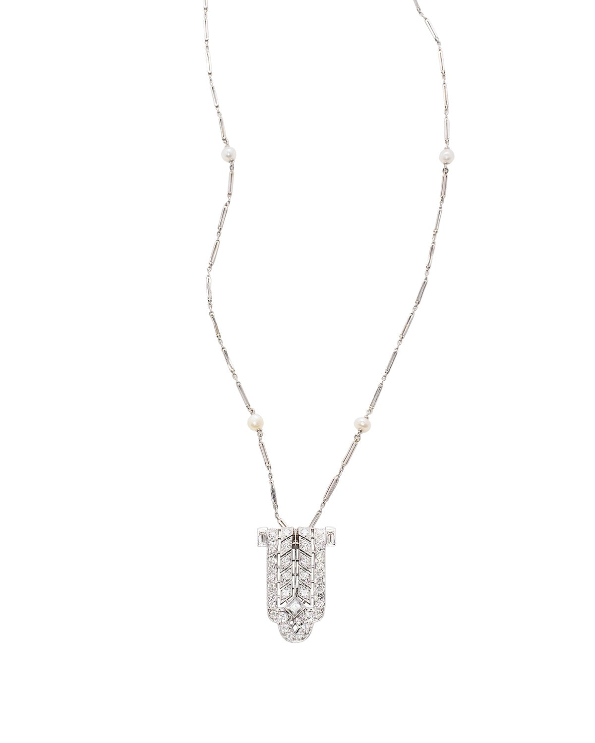 Art Deco Pendant in Platinum and Diamond with Pearl accents. 