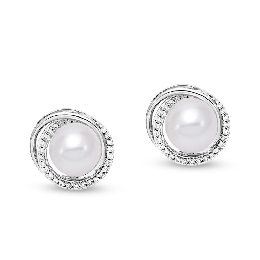 Convertible pearl studs with white gold and diamond surround that converts to a drop. 