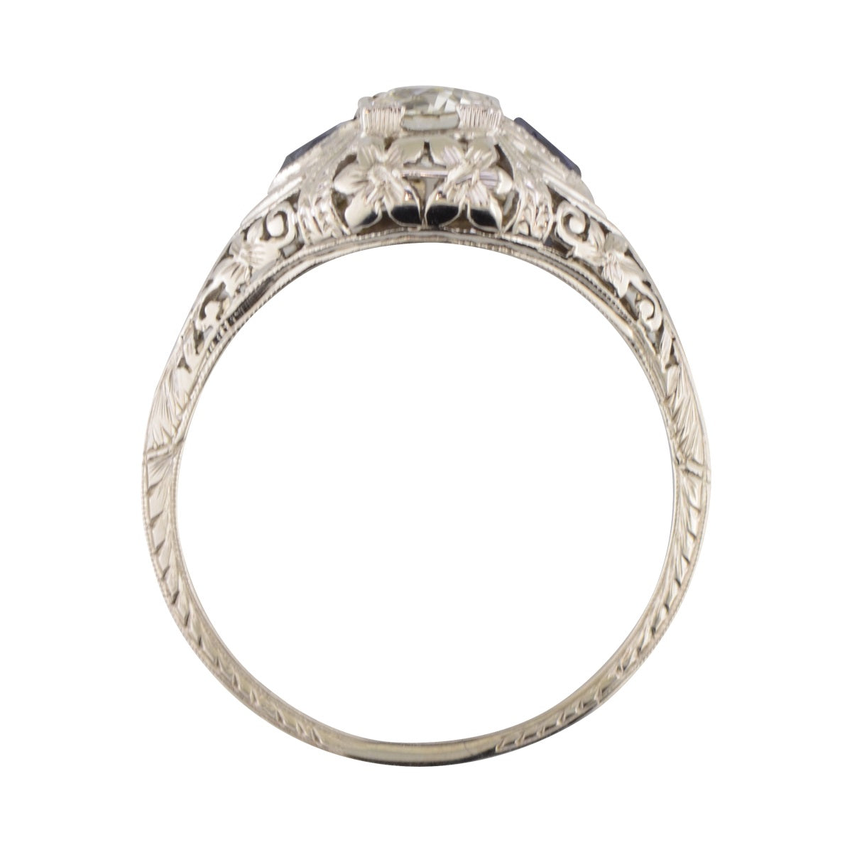 'Georgiana' filigree engagement ring in white gold with diamond and sapphire.