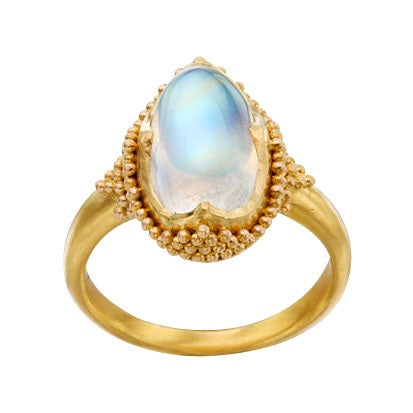 Oval blue moonstone cabachon ring in granulated 22k yellow gold. 