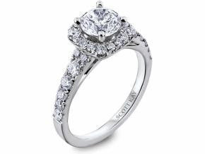 Diamond embellished halo solitaire engagement ring 