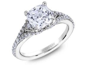 Platinum engagement ring with diamond shoulders
