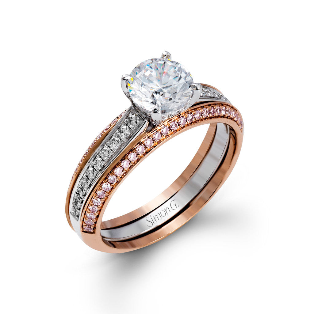 Two-tone engagement ring with rails of pink diamonds set in pink gold