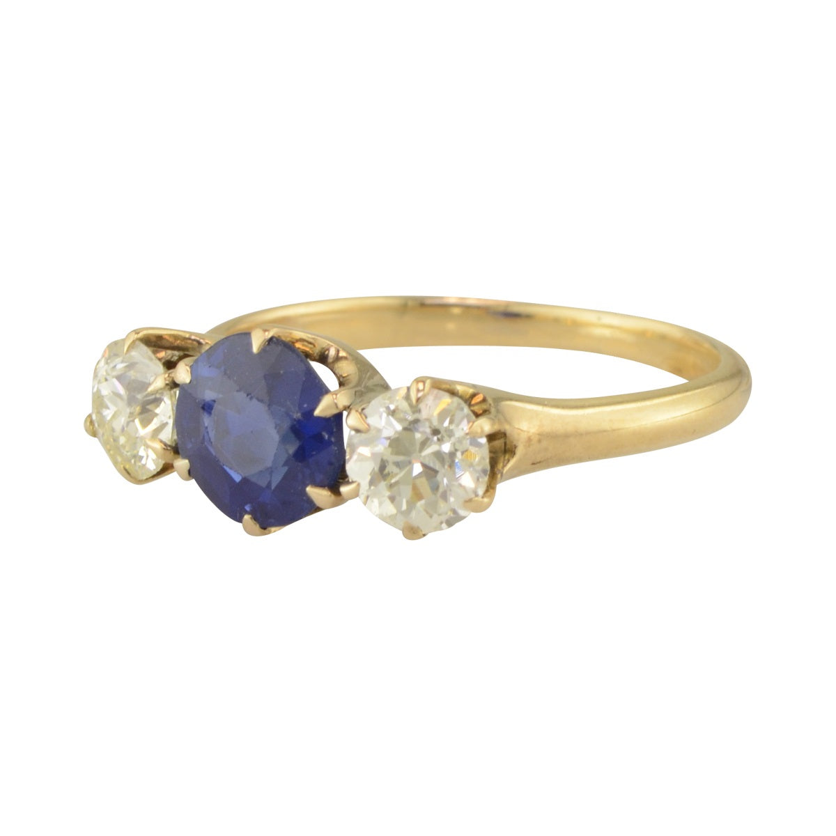 Three stone antique engagement ring with sapphire and diamond in 14k yellow gold. 